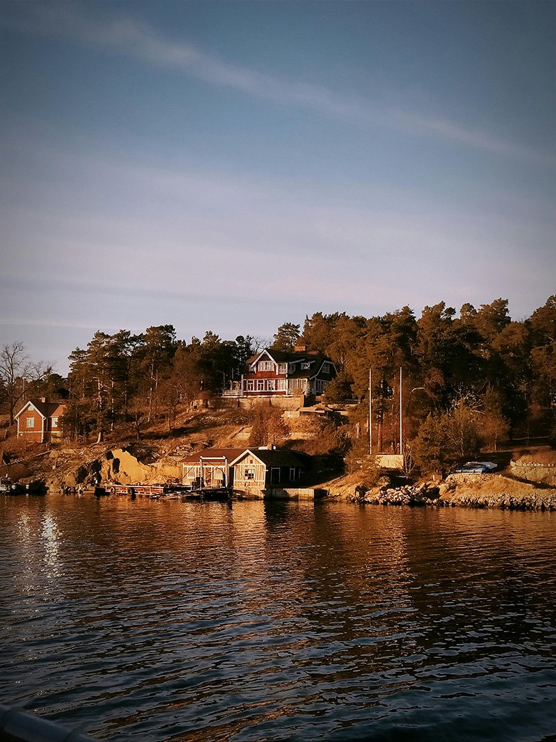 House on a lake in Sweden with a jetty.
